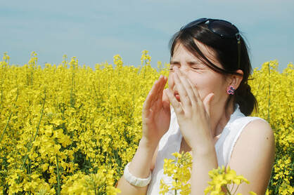 Woman having allergy attack
