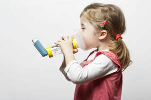 Little Girl with Inhaler
